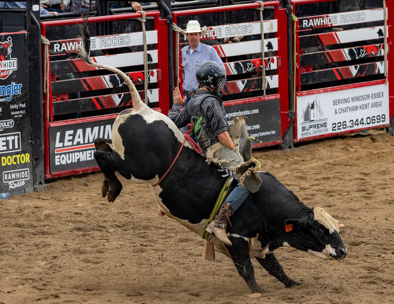 Bull riding at the Kingsville Pro Rodeo in Woodslee, Ontario, 2025